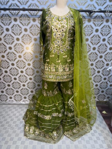 "Discover the allure of tradition with the Green Blockprint Gharara Set. This captivating ensemble combines vibrant blockprint designs with the classic flair of the gharara, offering a perfect blend of elegance and contemporary style. Elevate your wardrobe with this sophisticated set, ideal for any special occasion. 🌿✨ #TimelessElegance #GhararaStyle"